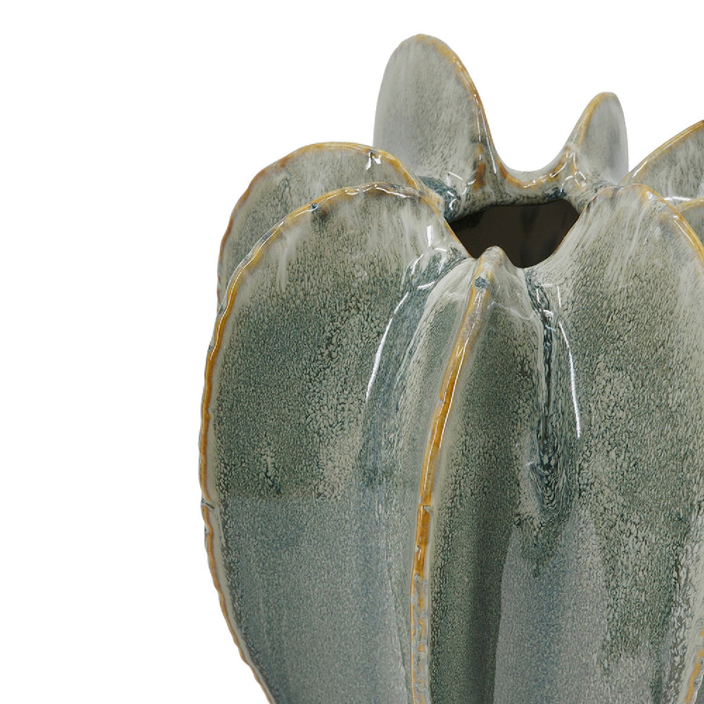 Sage green ribbed ceramic flower vase with a sculptural shape