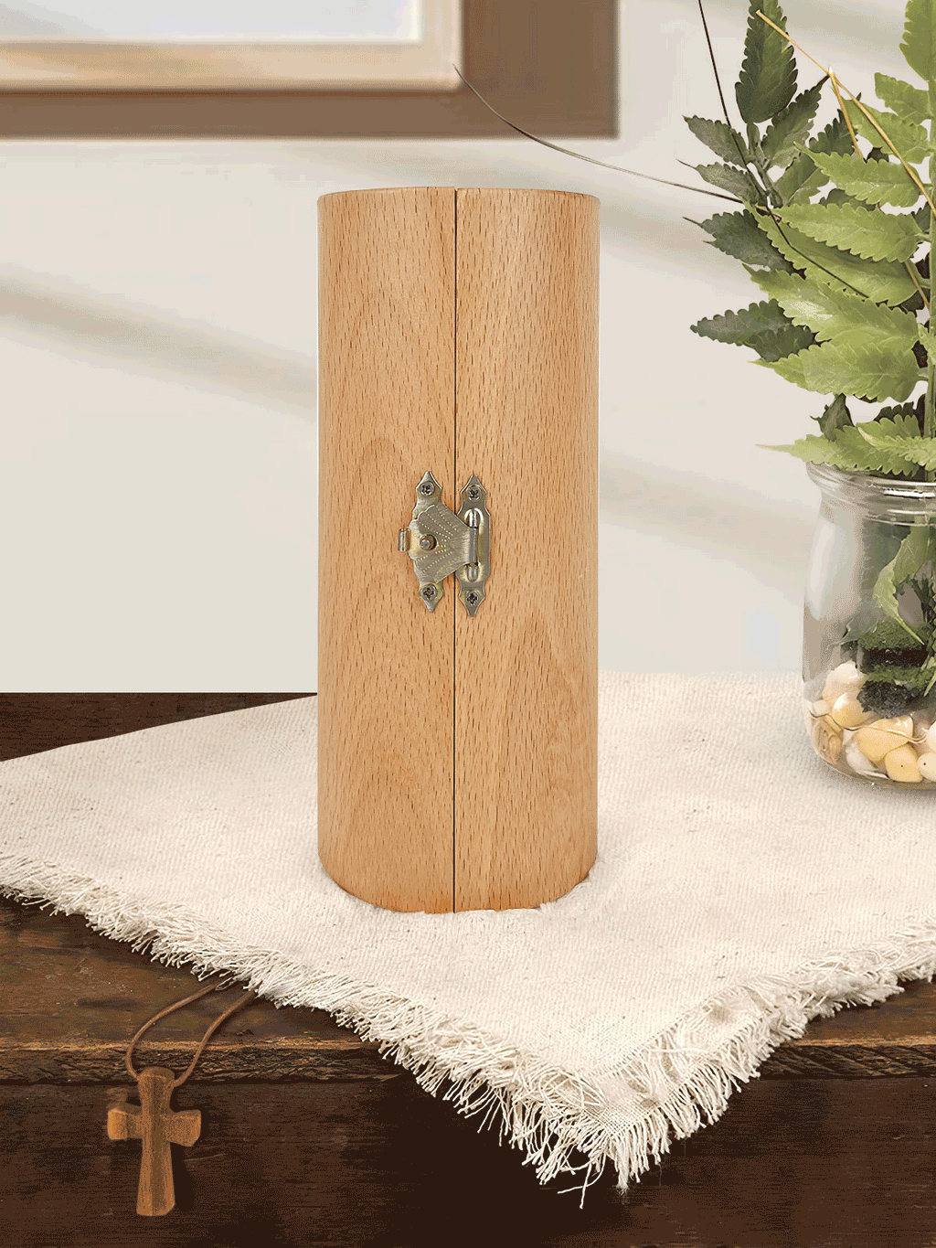 Openable brown wooden Christian cylinder sculpture with Jesus relief and engraved panels