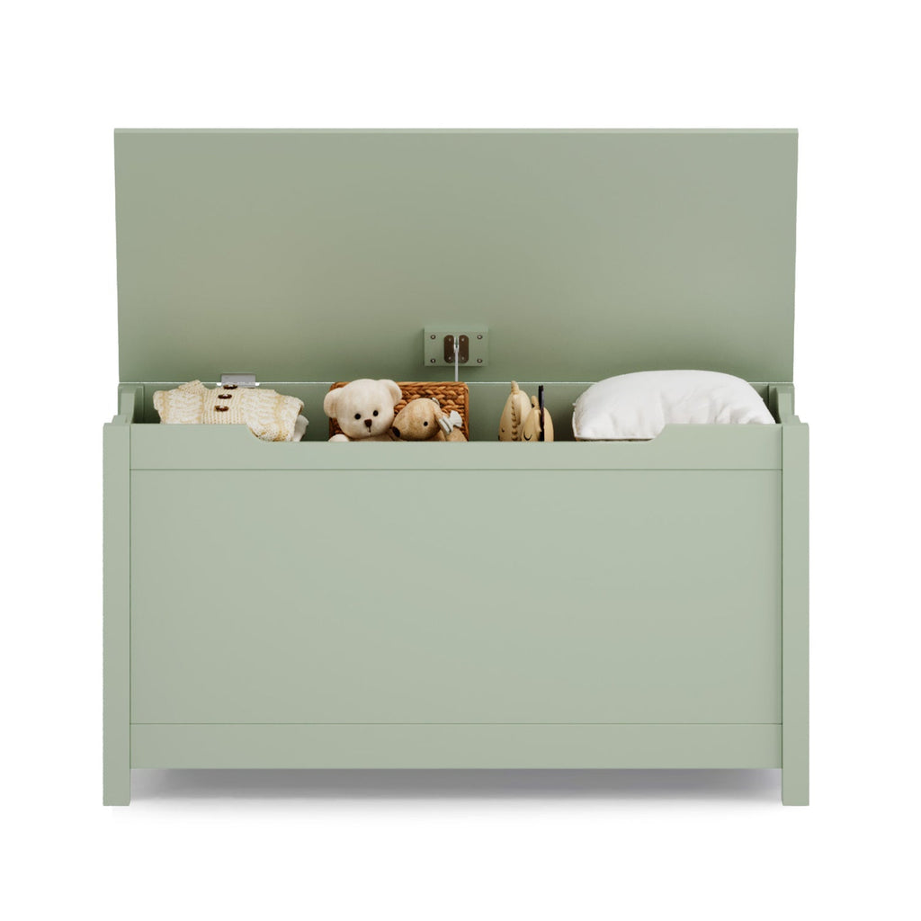 Green wooden toy box with hinged lid and raised legs