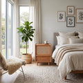 Brown wood-effect bedside table with woven front panel and drawer