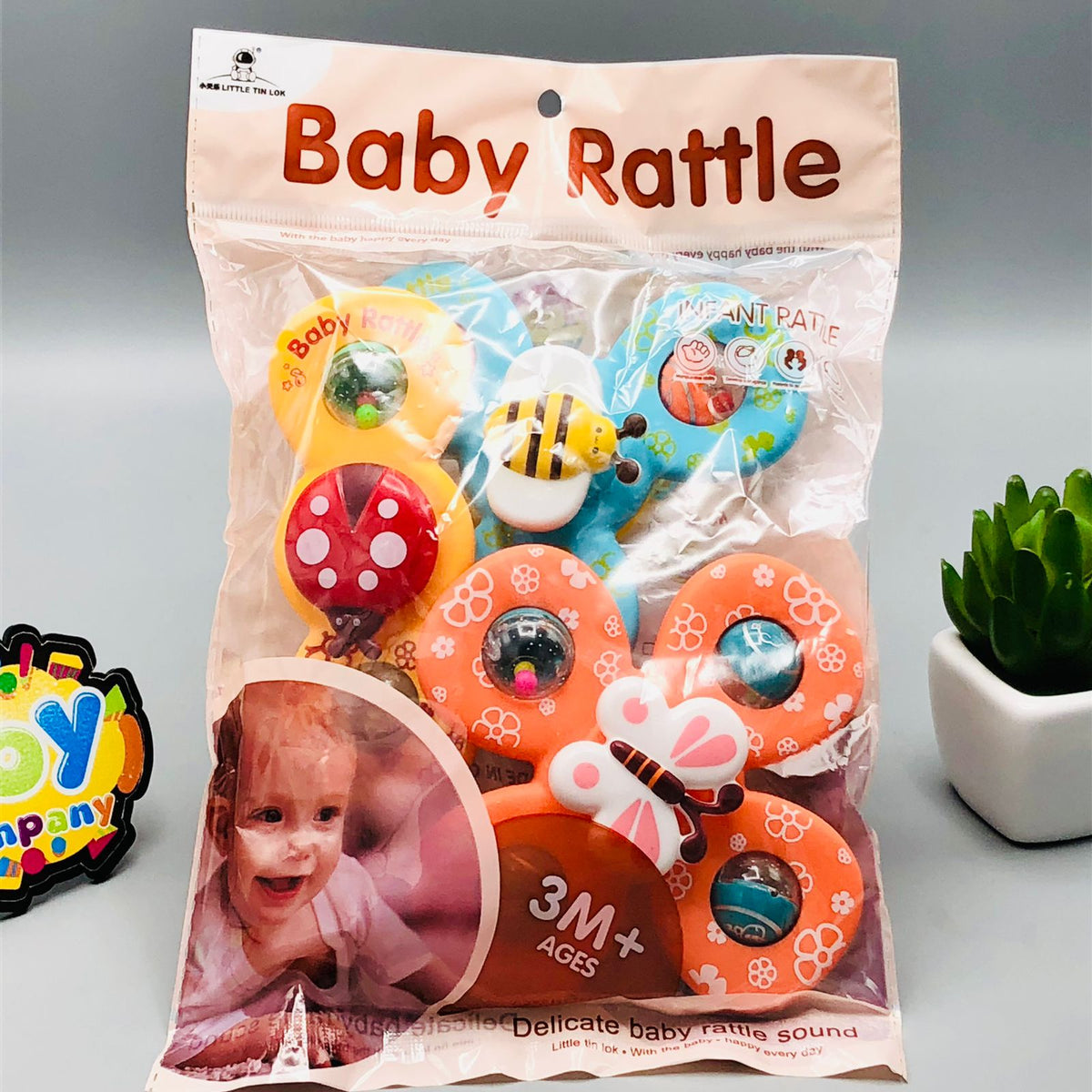 Colourful baby suction cup rattles with spinning insect designs