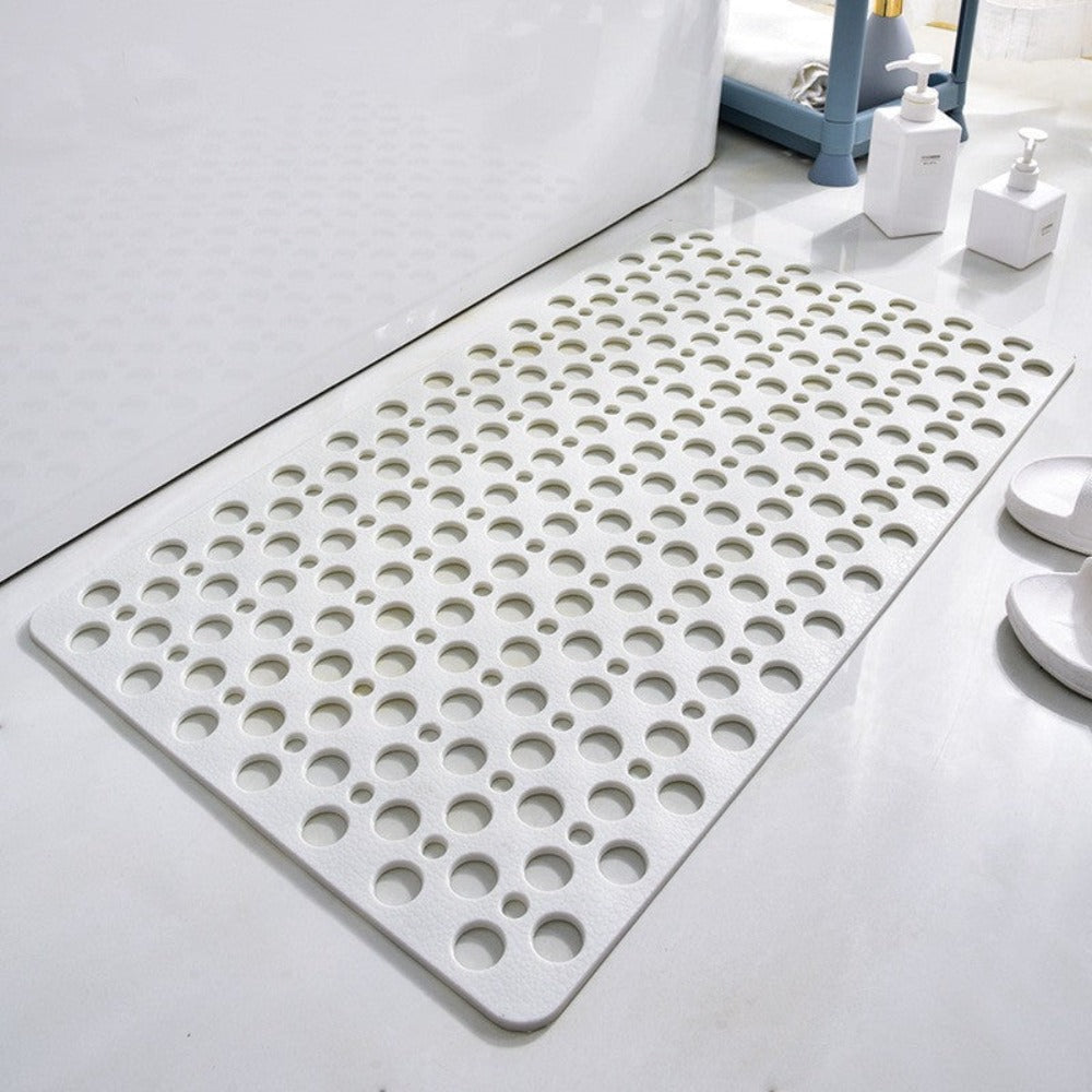 Perforated non-slip bath mat with repeated circular holes
