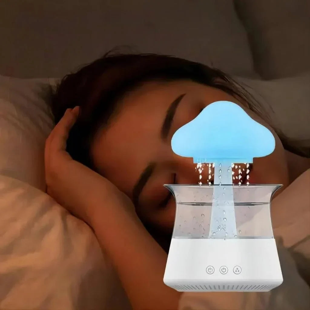 Cloud-shaped humidifier with transparent reservoir and decorative mist effect