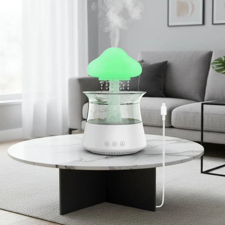 Cloud-shaped humidifier with transparent reservoir and decorative mist effect