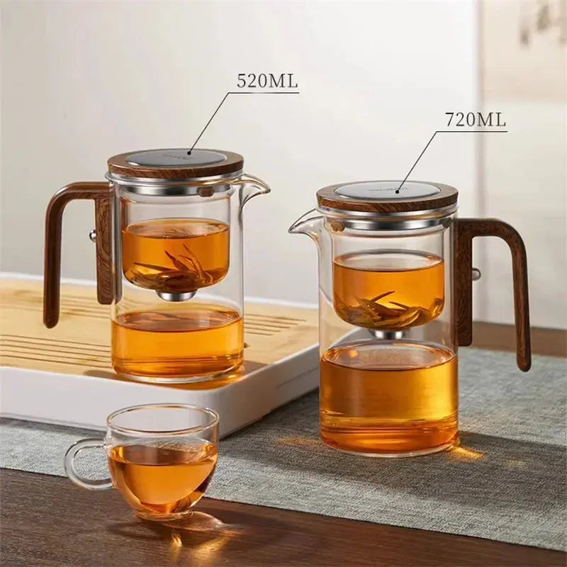 Clear glass tea infuser teapot with brown wood-effect handle and lid