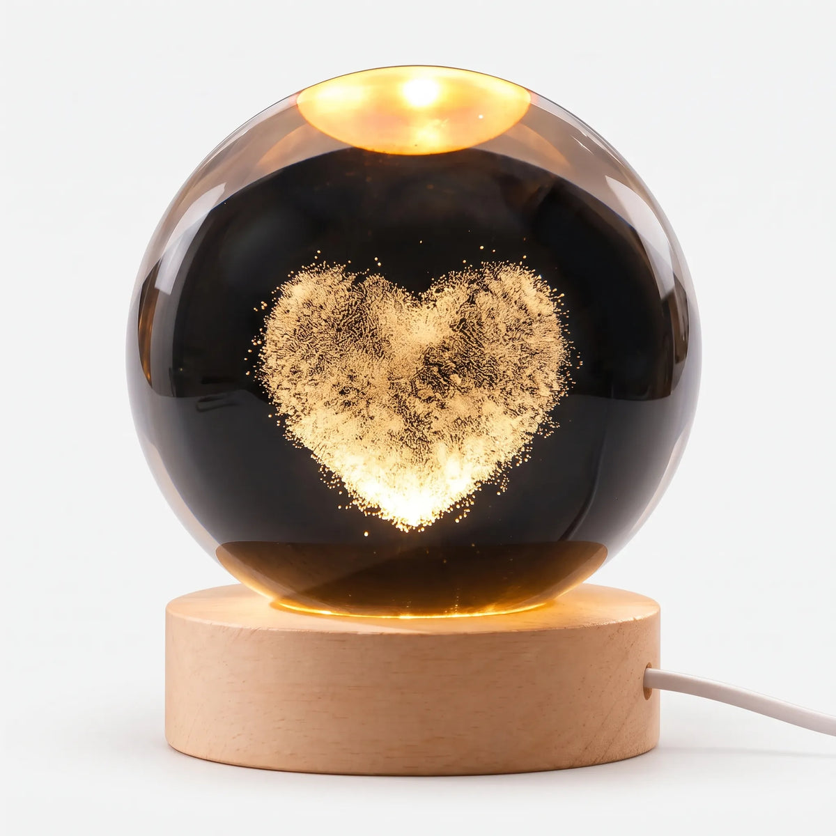Zophiro - Engraved Celestial Sphere Night Light Illuminating A Bedside Table At Night
