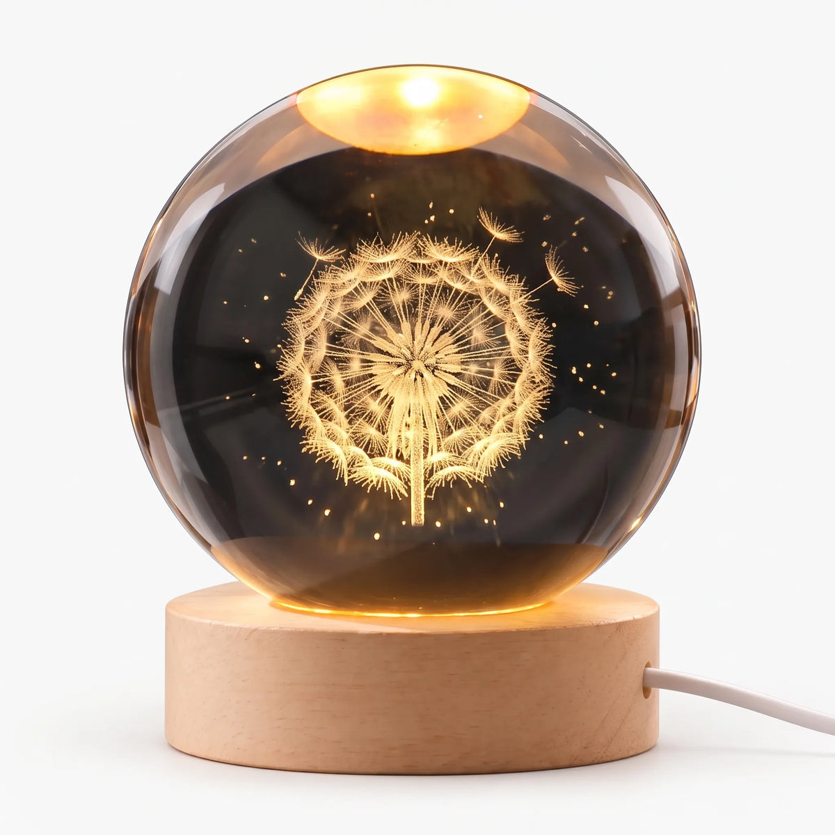 Zophiro - Engraved Celestial Sphere Night Light Illuminating A Bedside Table At Night