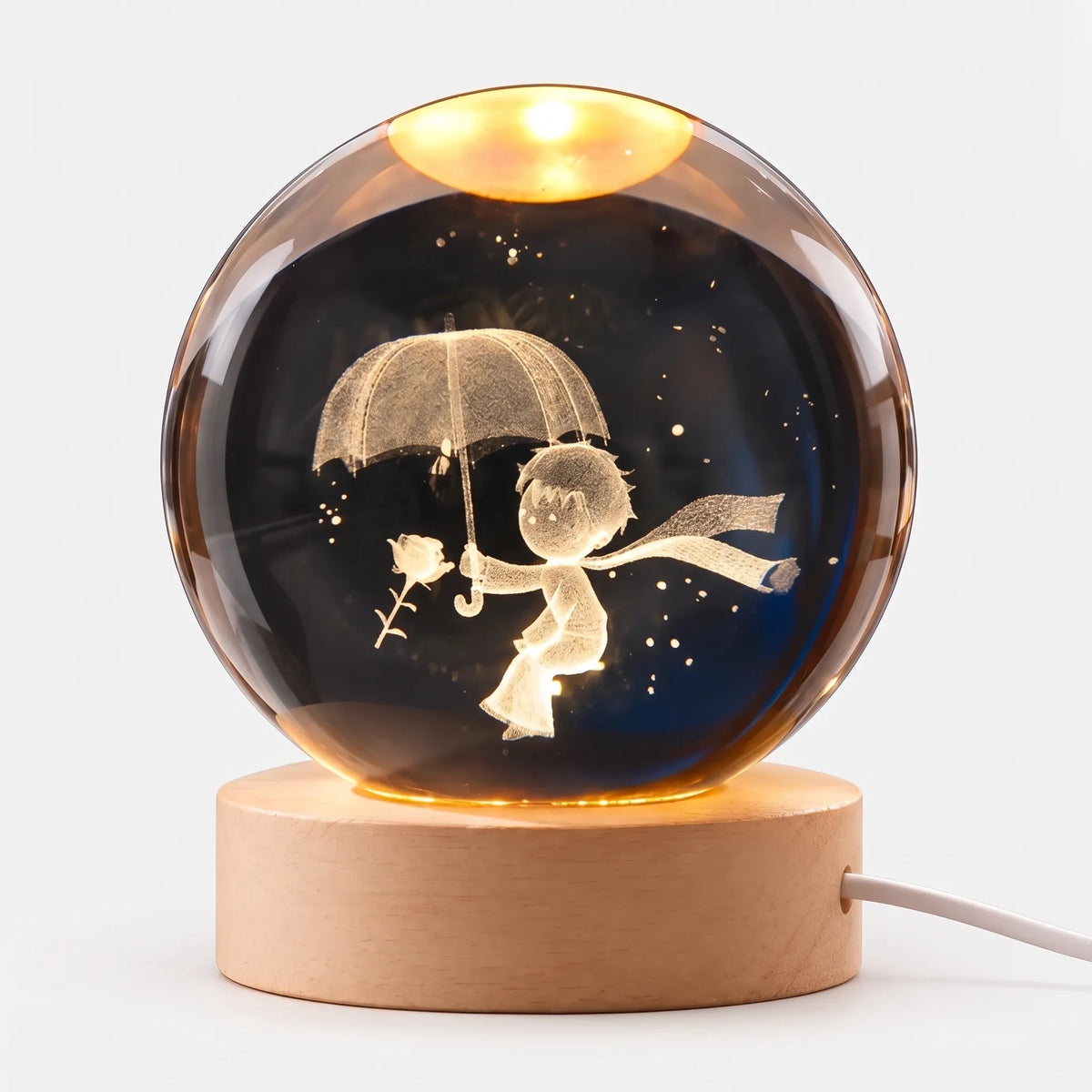 Zophiro - Engraved Celestial Sphere Night Light Illuminating A Bedside Table At Night