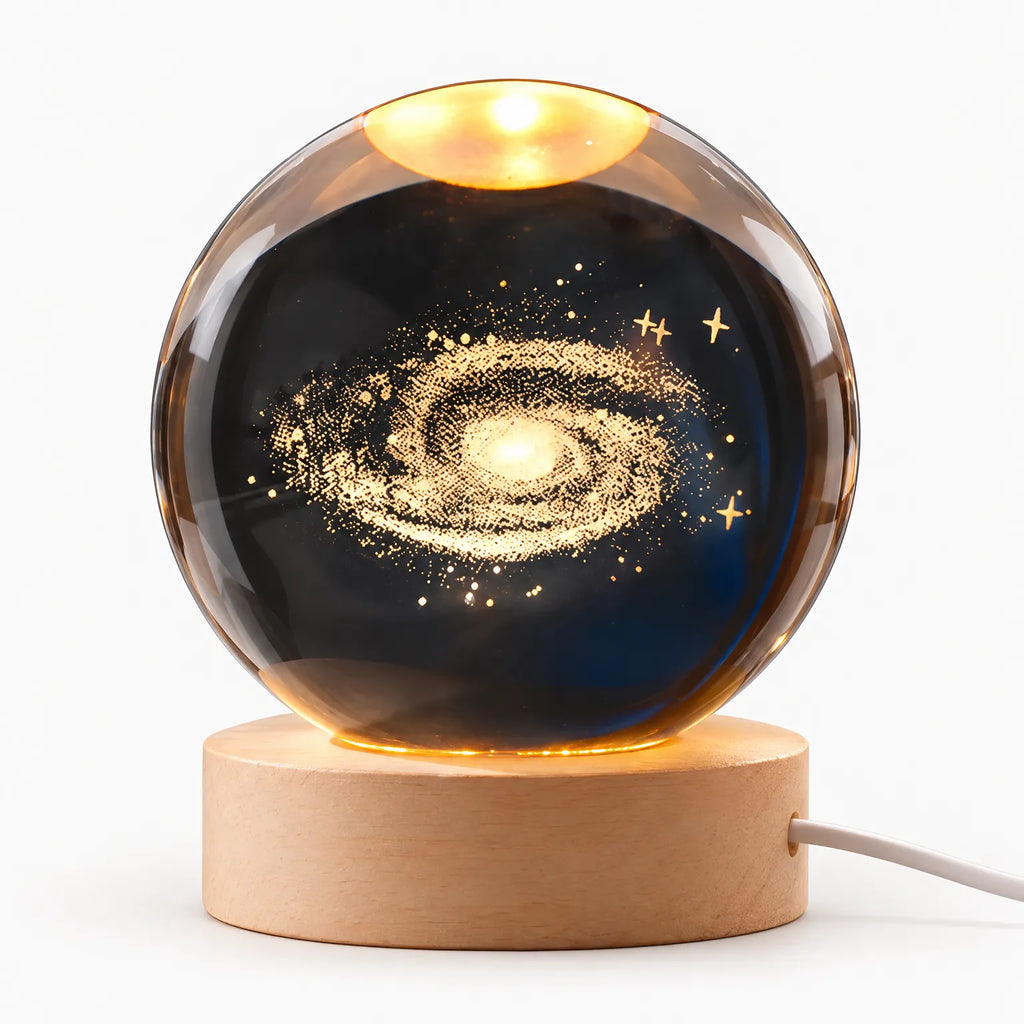 Zophiro - Engraved Celestial Sphere Night Light Illuminating A Bedside Table At Night