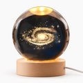 Zophiro - Engraved Celestial Sphere Night Light Illuminating A Bedside Table At Night