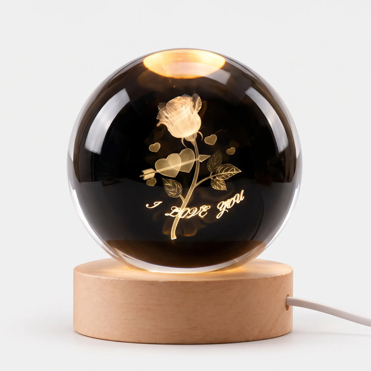 Zophiro - Engraved Celestial Sphere Night Light Illuminating A Bedside Table At Night