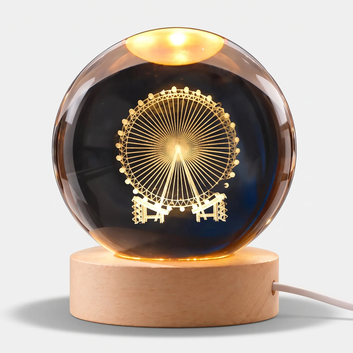 Zophiro - Engraved Celestial Sphere Night Light Illuminating A Bedside Table At Night