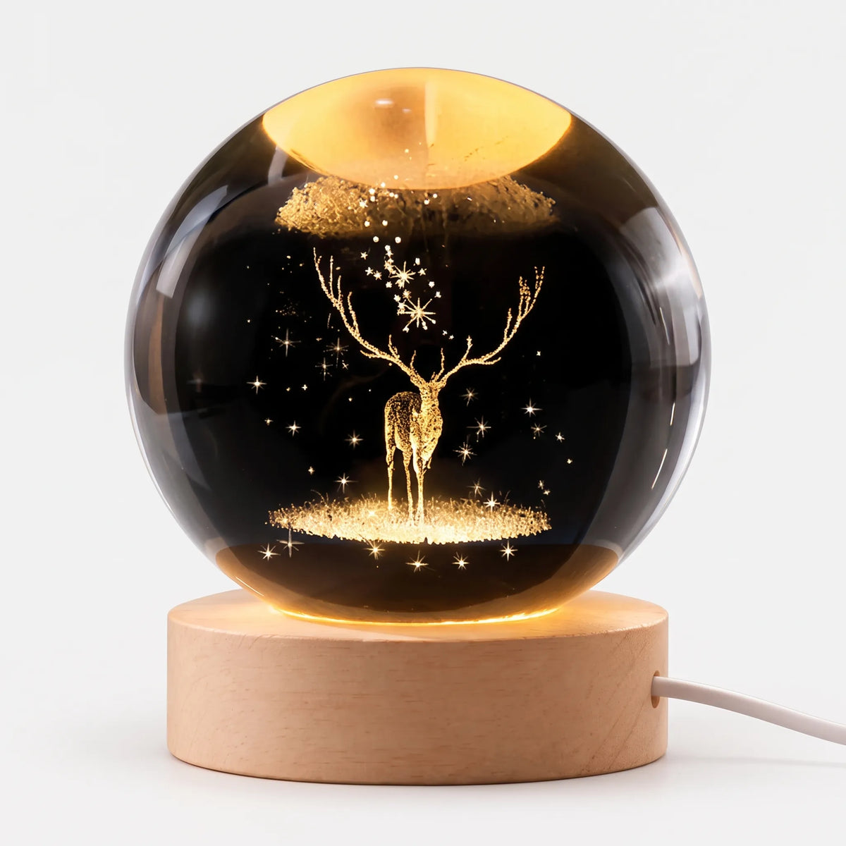 Zophiro - Engraved Celestial Sphere Night Light Illuminating A Bedside Table At Night