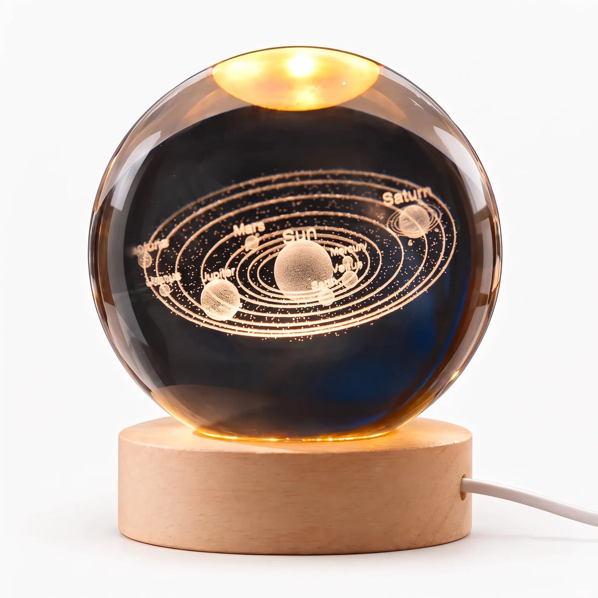 Zophiro - Engraved Celestial Sphere Night Light Illuminating A Bedside Table At Night