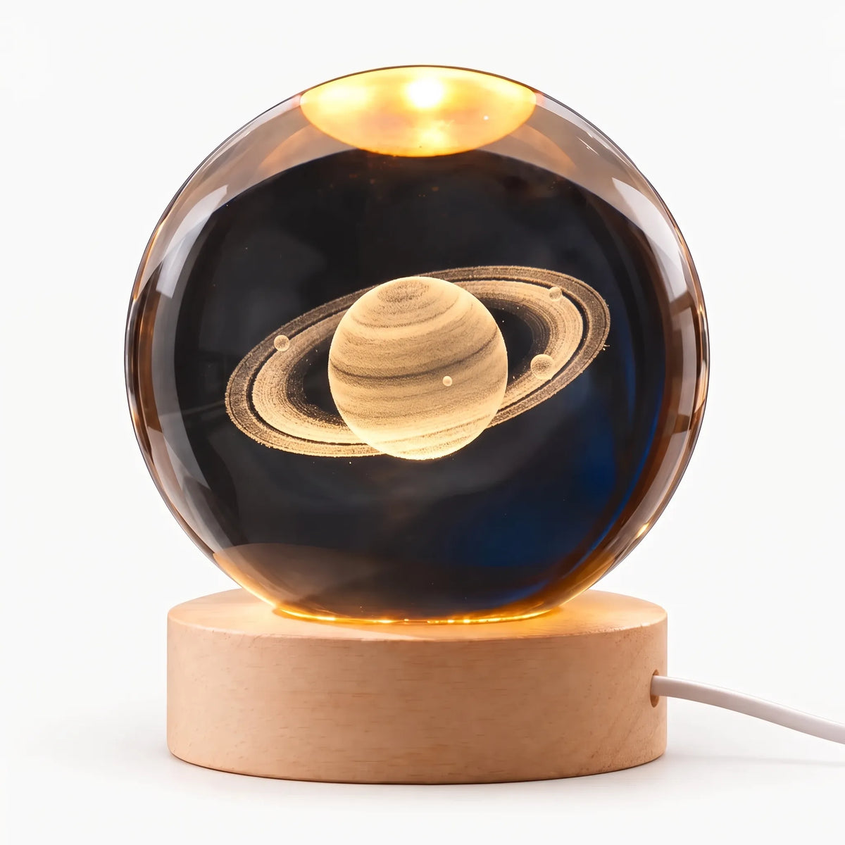 Zophiro - Engraved Celestial Sphere Night Light Illuminating A Bedside Table At Night