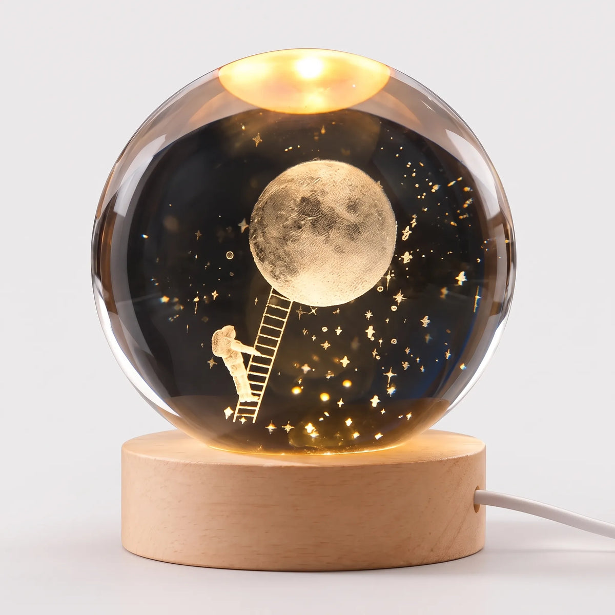 Zophiro - Engraved Celestial Sphere Night Light Illuminating A Bedside Table At Night