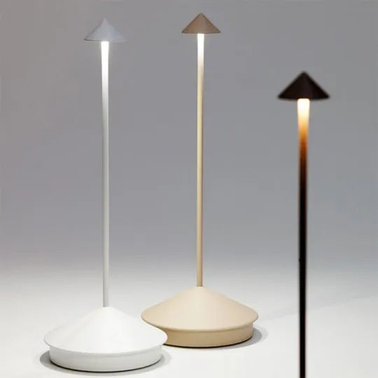 Wireless LED table lamp with a slim stem, conical shade and round base