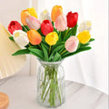 Mixed colour artificial tulip bouquet with green leaves