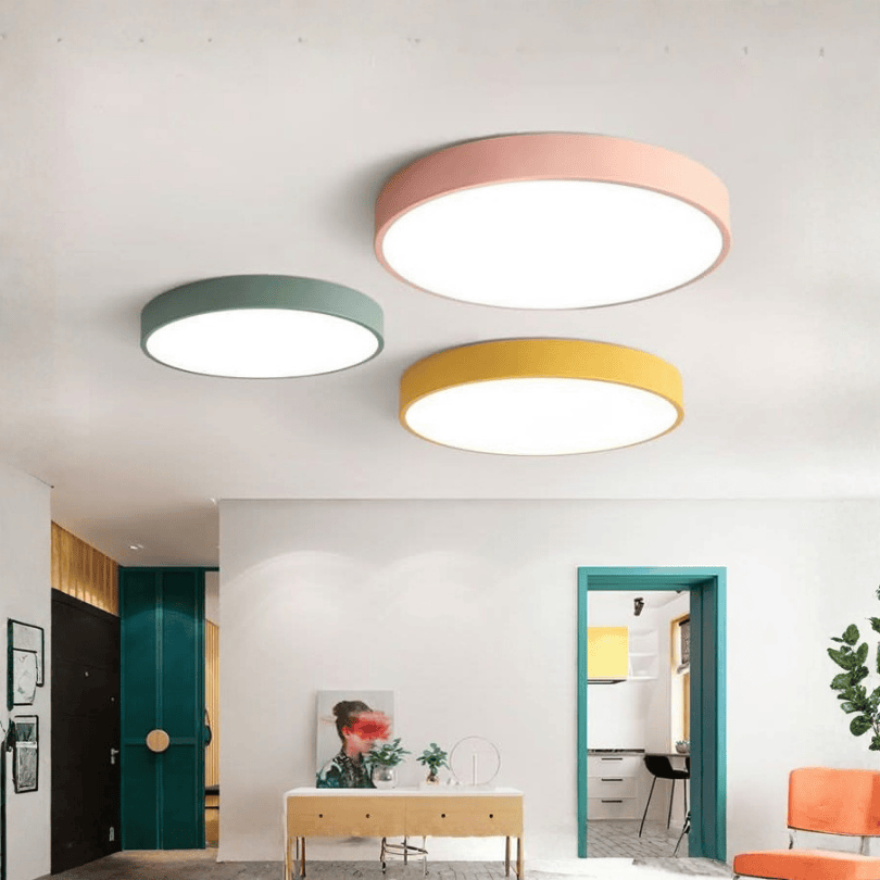 Round flush-mount LED ceiling light with a wide white diffuser panel