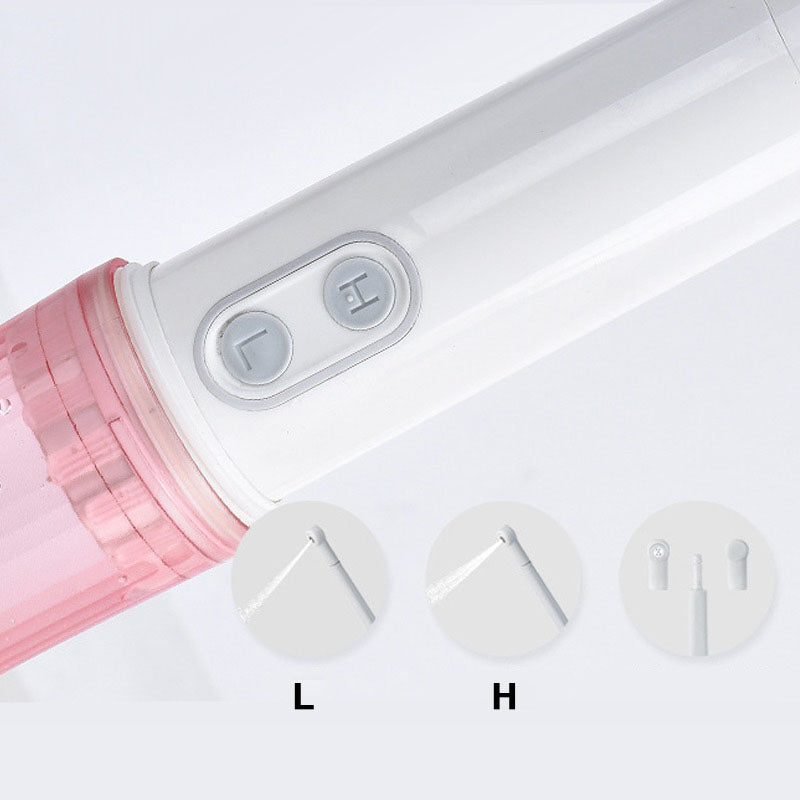 Portable travel bidet bottle with angled nozzle