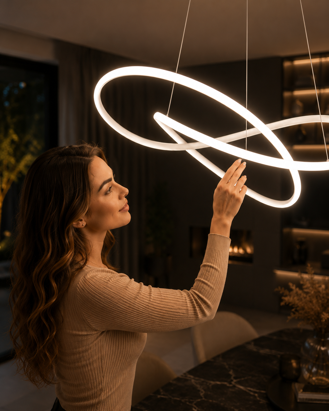 Pendant ceiling light with an illuminated interwoven clover loop design