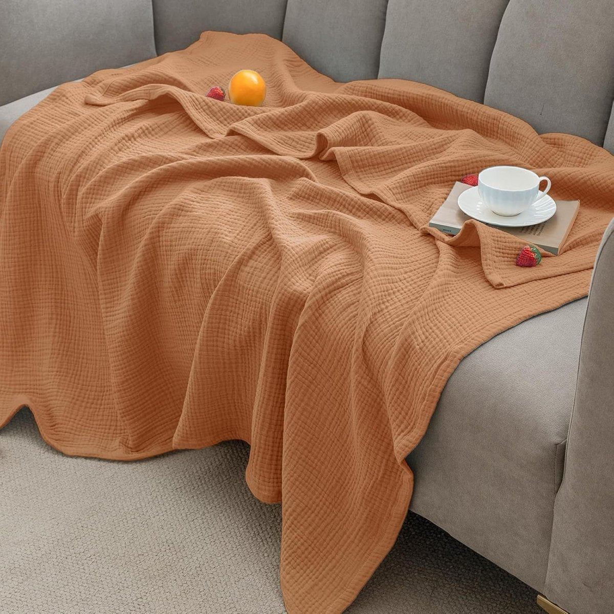 Textured wavy throw blanket draped over a chair
