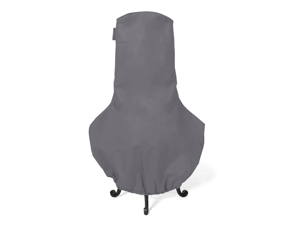 Charcoal grey shaped cover fitted over a chiminea-style outdoor heater