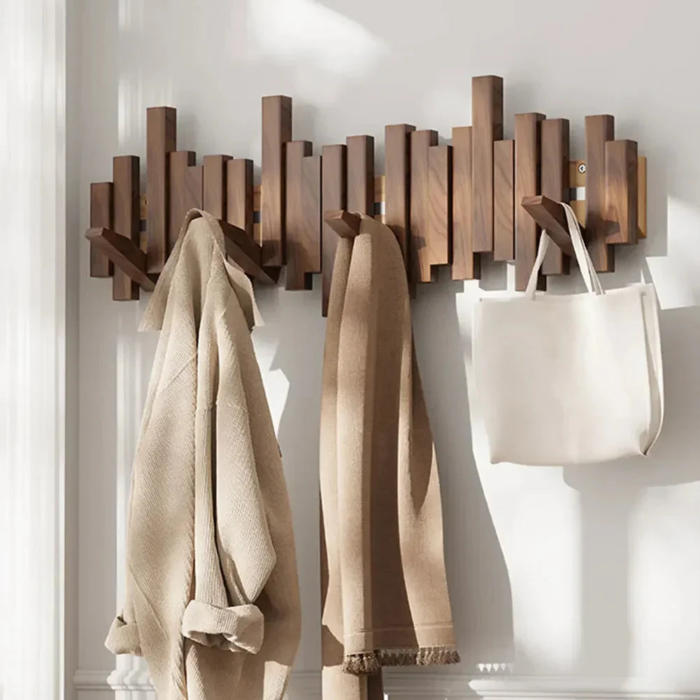 Wall mounted coat rack with staggered wood-effect pegs