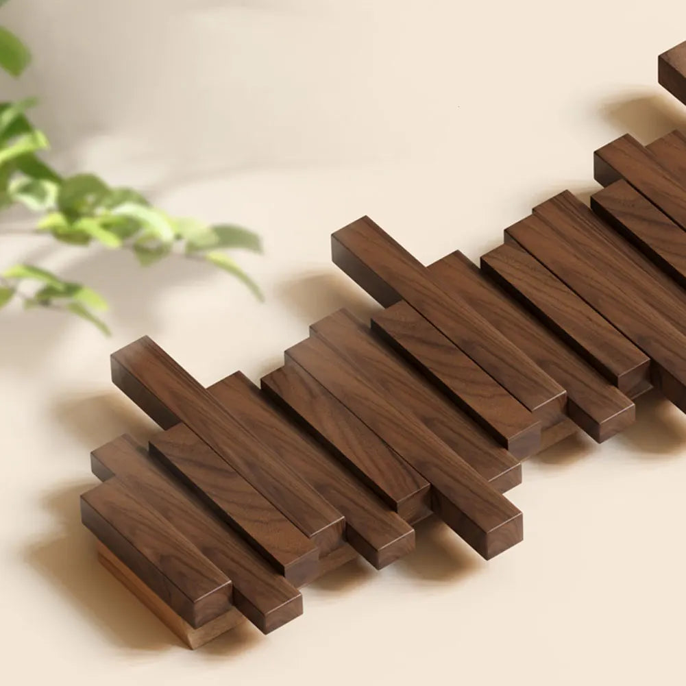 Wall mounted coat rack with staggered wood-effect pegs