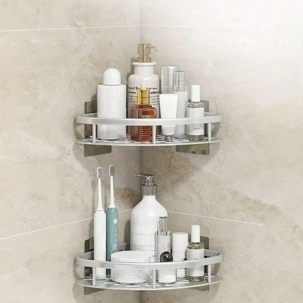 Two-tier corner shower caddy with slotted shelves and adhesive wall plates