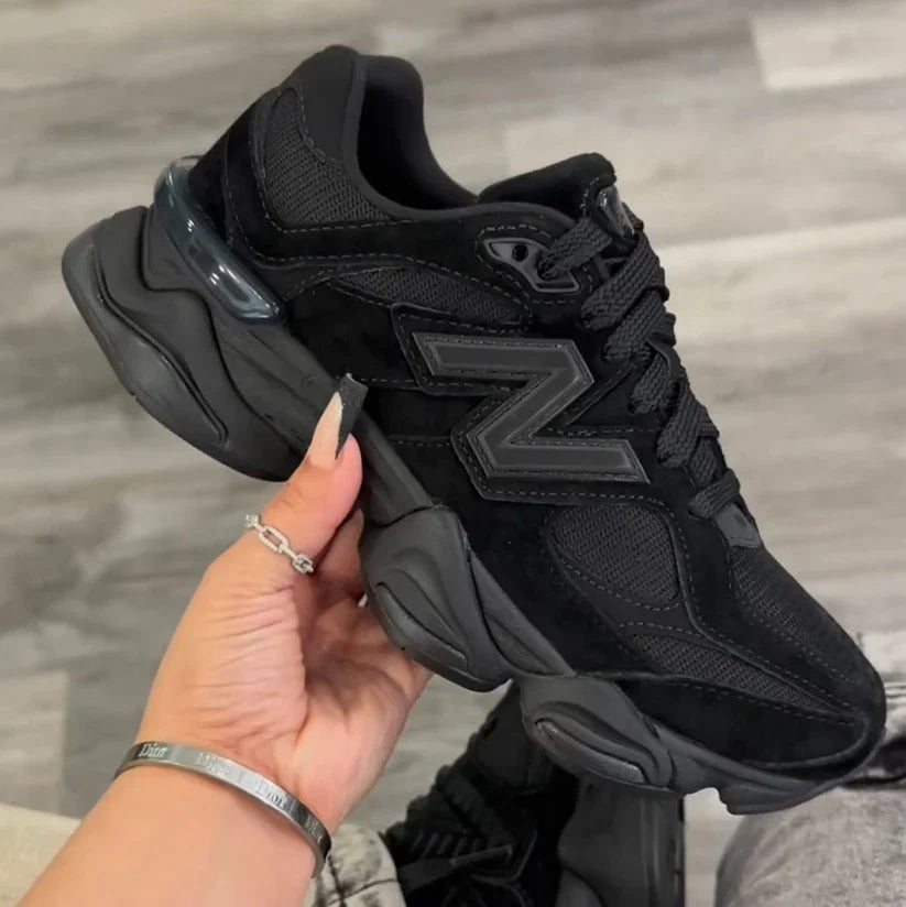 Black low top lace-up trainers with mesh panels and chunky layered soles