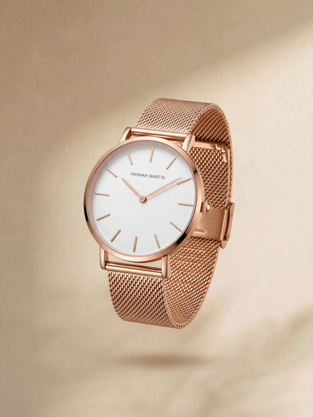 Analogue watch with round dial and textured mesh-style strap