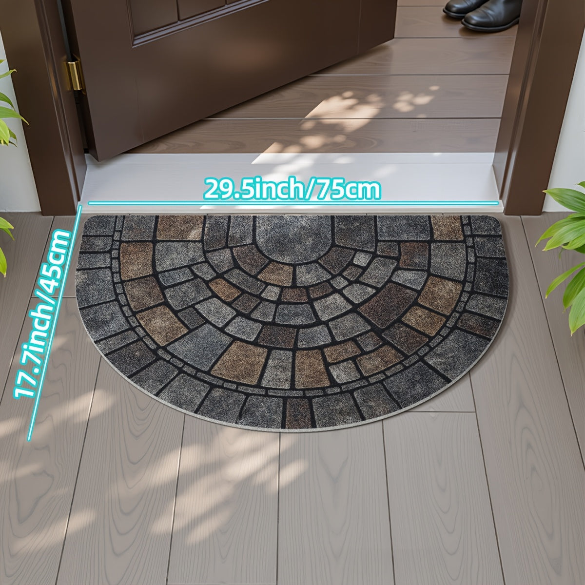 Grey half-circle door mat with geometric mosaic pattern