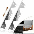 Stainless steel stove gap covers beside a cooker and kitchen worktop