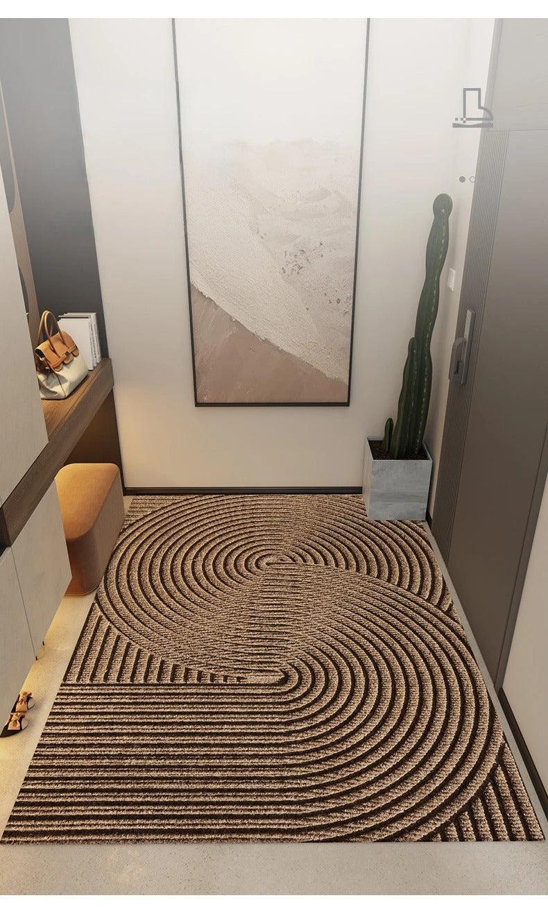 Rectangular geometric ribbed door mat on a hallway floor