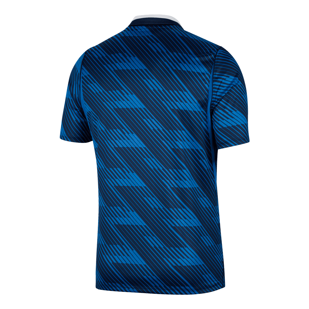 Blue short-sleeve football shirt with geometric pattern and white collar