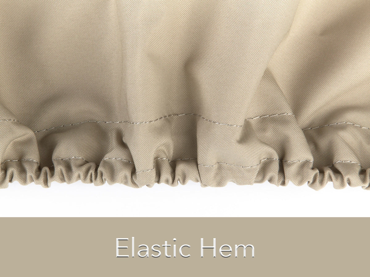 Khaki cover draped over an outdoor portable generator