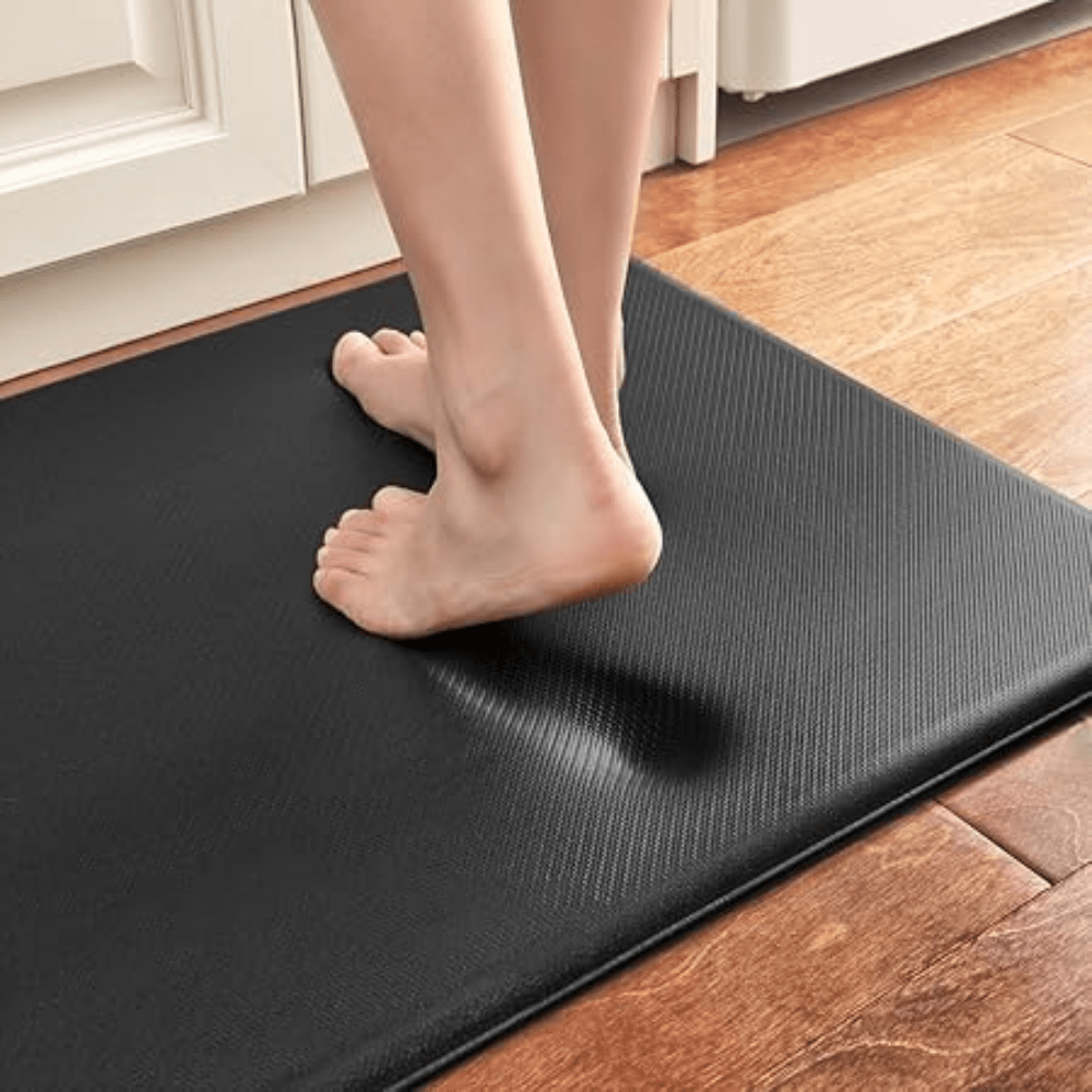 Textured rectangular anti-fatigue kitchen mat on a tiled floor