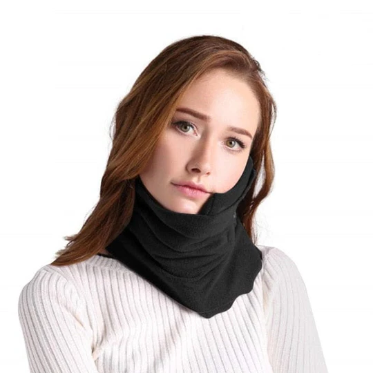 Compact travel neck pillow worn around the neck