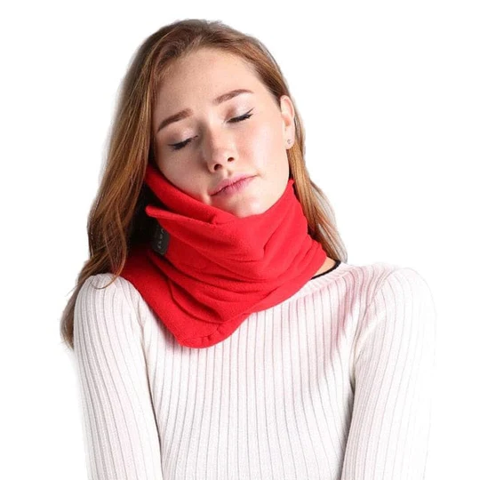 Compact travel neck pillow worn around the neck