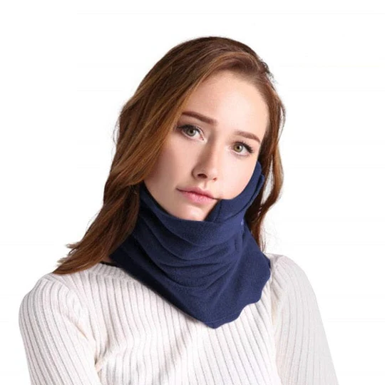 Compact travel neck pillow worn around the neck