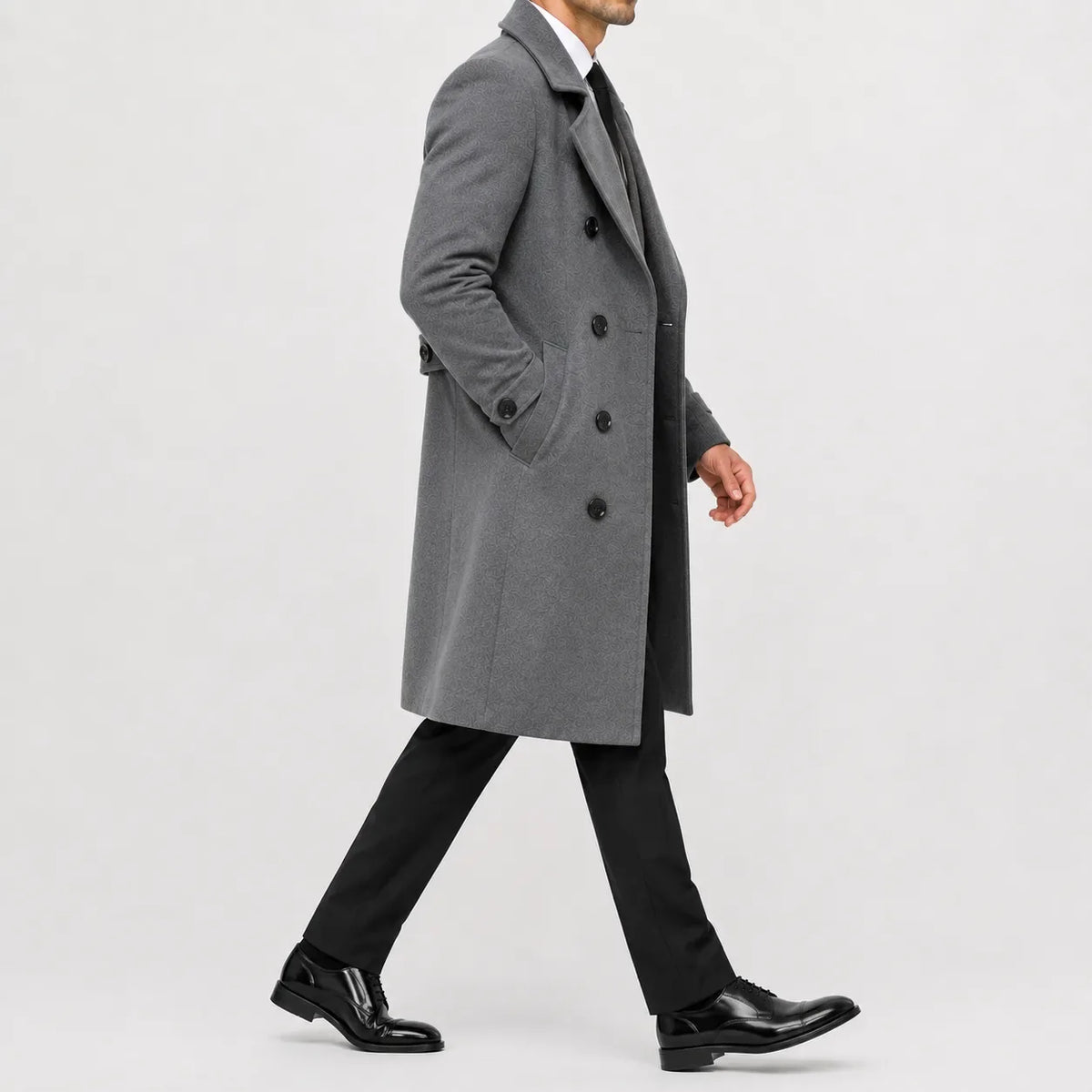 Long double-breasted trench coat with notched lapels and cuff tabs