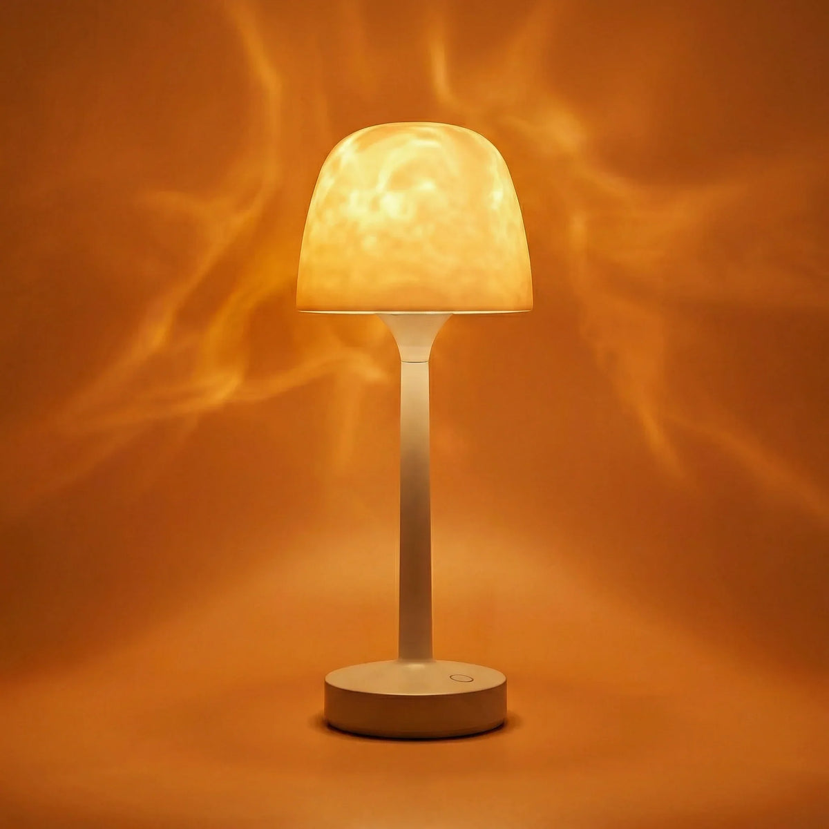 Cream wireless table lamp casting warm aurora-style light patterns