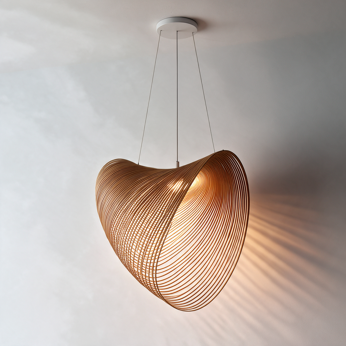 Sculptural pendant light with a curved open wire shade