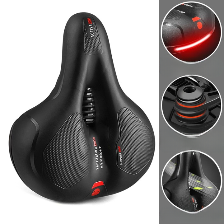 Ergonomic bicycle saddle with ventilated centre and textured comfort panels