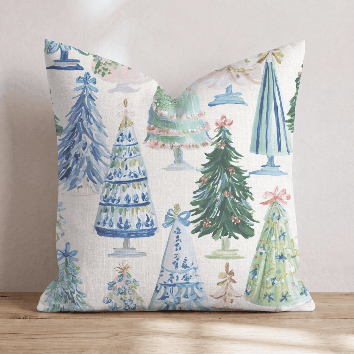 Cream Christmas throw cushion with illustrated decorated tree pattern and piped edging