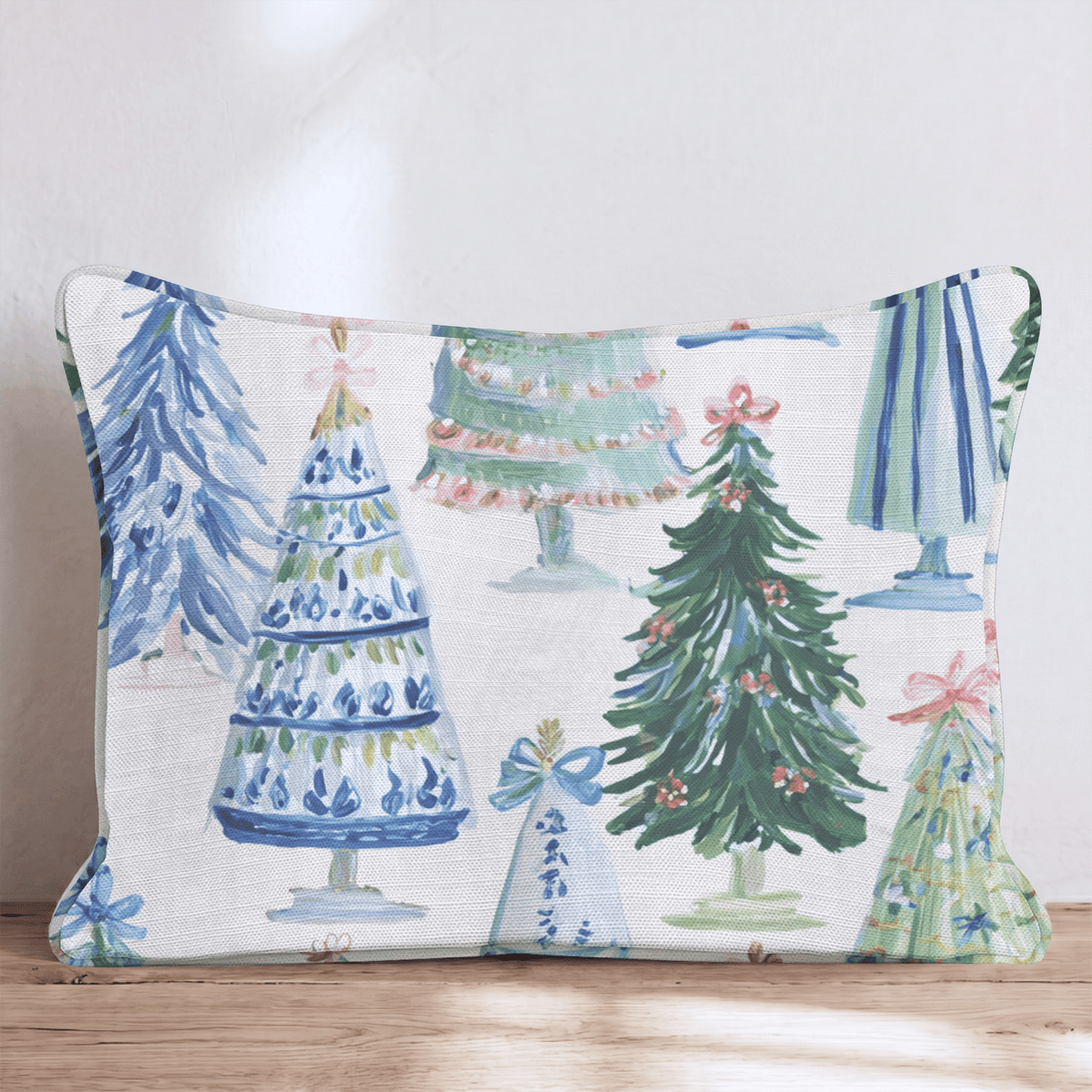 Cream Christmas throw cushion with illustrated decorated tree pattern and piped edging