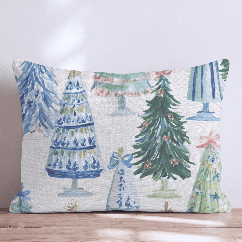 Cream Christmas throw cushion with illustrated decorated tree pattern and piped edging