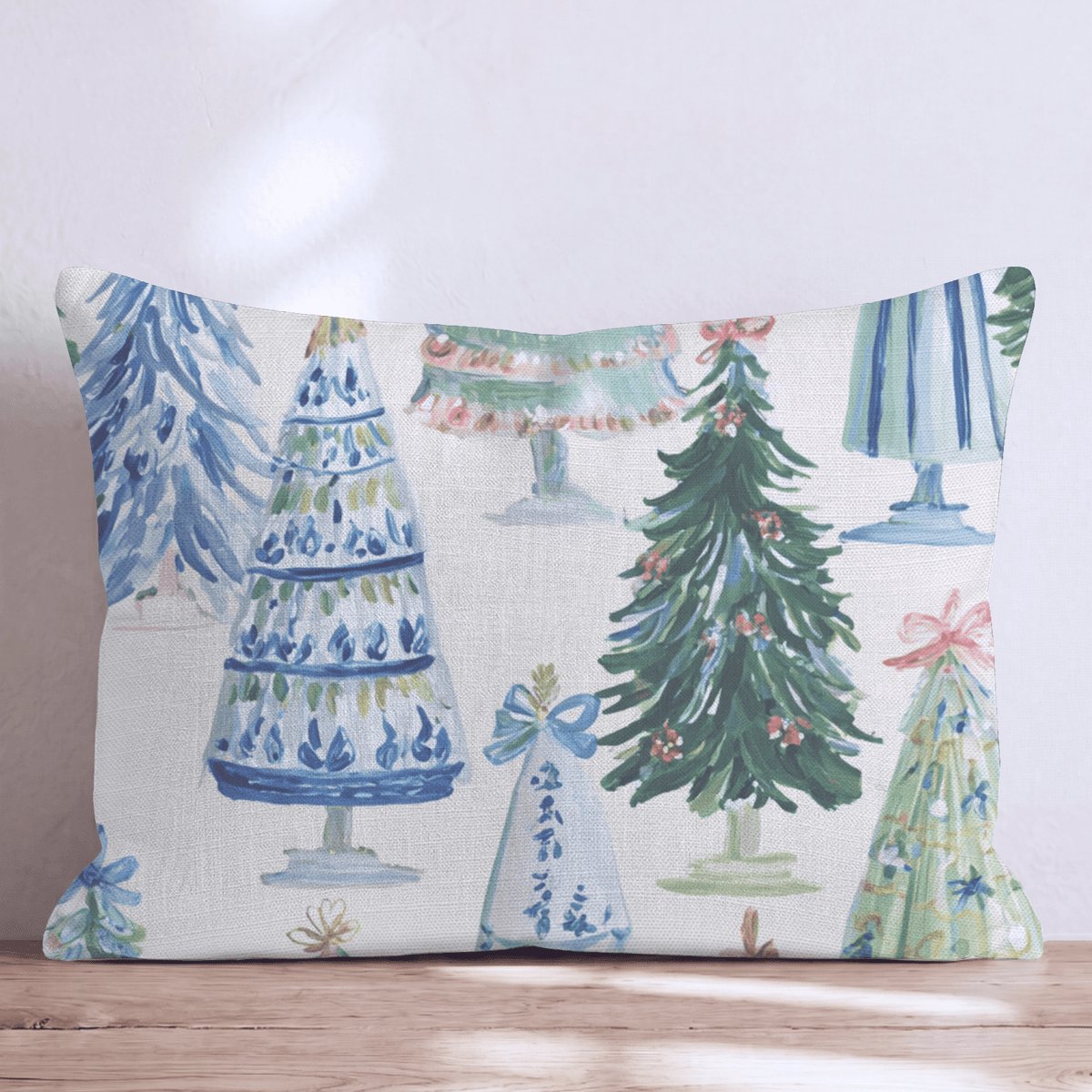 Cream Christmas throw cushion with illustrated decorated tree pattern and piped edging