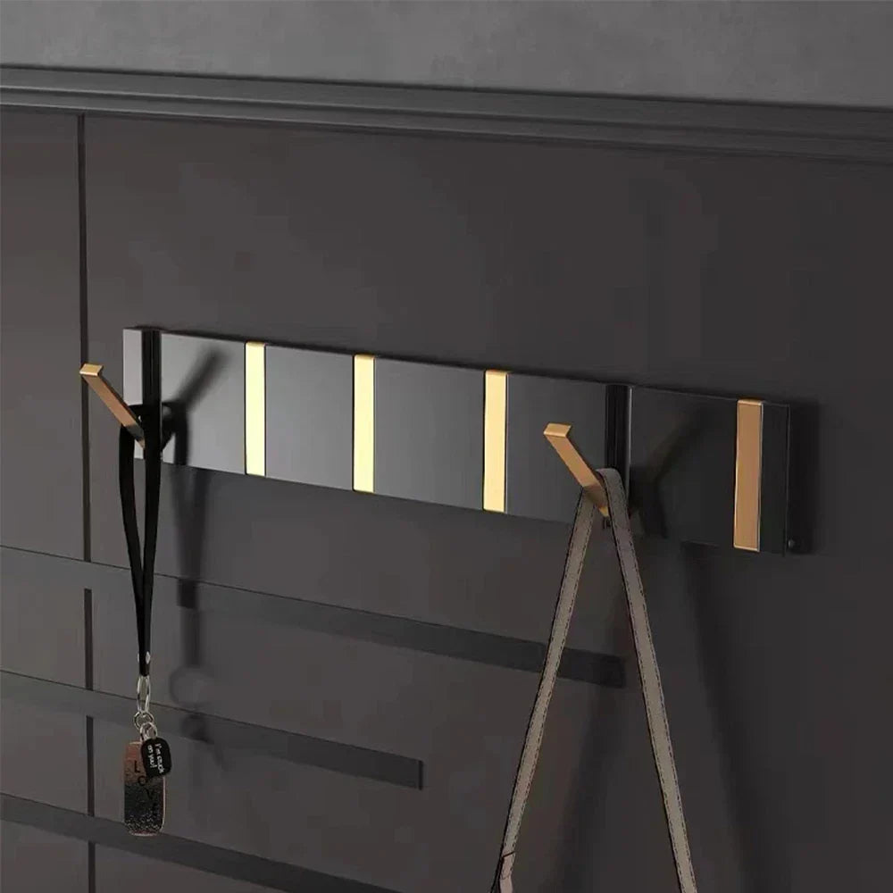Wall-mounted rack with two folding hooks